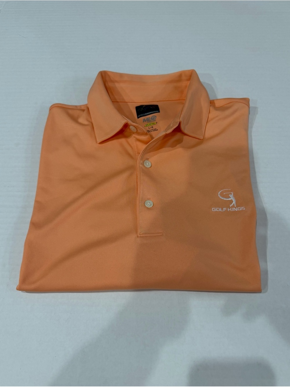Greg Norman Collection Orange Golf Polo with Embroidered Logo